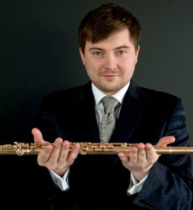 Łukasz Długosz mit Konzertflöte